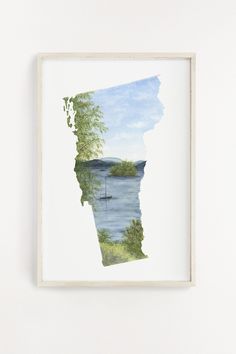 a watercolor painting of the state of wisconsin on a white wall with a wooden frame