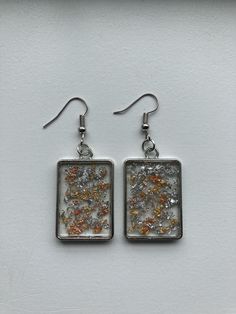 These eye-catching rectangle resin earrings are made with gold, rose gold, and silver foil flakes. Cottage Grove, Rose Gold And Silver, Glitter Earrings, Rose Gold Foil, Resin Earrings, Lovely Earrings, Clear Resin, Blue Glitter, Silver Foil