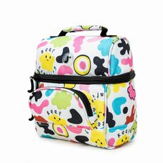 This compact insulated lunch bag has a small footprint, like a mini lunch bag, and is small enough to fit in a child’s backpack or crowded office fridge, yet it’s large enough to hold a medium lunch. This cooler lunch bag for women holds a 12-16 oz drink, a yogurt cup, a fruit cup, a small cottage cheese container, an apple, and 2 frozen gel packs. Your drink bottle secures in the top to keep it from squishing your sandwiches. The front pocket of this small insulated lunch box is perfect for car Cute Multicolor Lunch Box For Everyday Use, Functional Multicolor Lunch Box For Everyday Use, Functional White Lunch Bag For Everyday, Functional School Lunch Bag Backpack, Functional Backpack Lunch Bag For School, Functional School Backpack Lunch Bag, Cute White Lunch Bag For Travel, Functional White Lunch Bag For Travel, Back To School Multicolor Lunch Box