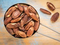 some nuts are in a bowl on a table