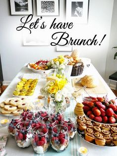 a table filled with lots of food and desserts