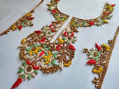 Introducing our exquisite Colorful Embroidered Applique Sew-On Neckline Patch with Sleeves, showcasing intricate handcrafted Indian brass artwork that will elevate your garments to a whole new level of elegance and charm. This meticulously crafted patch is perfect for DIY enthusiasts looking to add a touch of Indian-inspired beauty to their dresses, saris, suits, and lehengas. ➤➤This set contains a Neckline and 2 sleeve patch- Crafted from high-quality materials, this applique patch guarantees d Applique Work Lehenga, Multicolor Floral Embroidered Dress For Eid, Red Embroidered Dress With Dabka Work For Wedding, Ceremonial Embroidered Multicolor Sets, Multicolor Embroidered Fabric With Dabka Work For Weddings, Multicolor Embroidered Handwork Sets For Wedding, Handwork Multicolor Embroidery Wedding Sets, Anarkali Multicolor Floral Embroidered Dress, Ceremonial Multicolor Resham Embroidery Sets