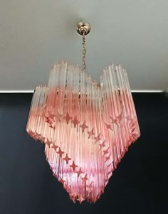 a pink chandelier hanging from the ceiling