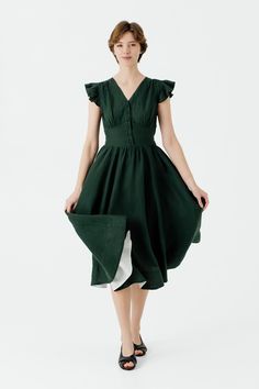 Step into sophistication with our Evergreen Diane Dress featuring Short Ruffle Sleeves. The below-the-knee full-circle skirt, hidden side zip, and adorable ruffle sleeves make it an ideal choice for evening events or outdoor celebrations. A perfect blend of charm and comfort, this dress is sure to turn heads at any occasion. Discover more from Sondeflor Shop here: https://www.etsy.com/shop/SondeflorShop DRESS DESIGN FEATURES: * Full-circle skirt * Side seam pockets * Hidden side zip * Ruffle sle Womens Summer Dress, Green Linen Dress, Boho Mid Century Modern, Clothes Wishlist, Boho Mid Century, Wool Clothing, Full Circle Skirts, 50s Dresses, Linen Dresses