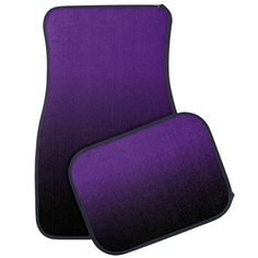 two purple and black car mats