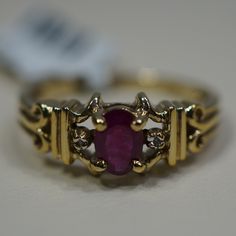 Nwt 10ky Gold 6 X 4mm Oval Genuine Ruby And Round Diamond Ring. Ring Is A Size 7 1/2. Gold Oval Ruby Ring For Formal Occasions, Gold Ruby Ring Stamped 14k With Oval Shape, Oval Ruby Ring In Gold Stamped 14k, Classic Gold Oval Ruby Ring, Classic Oval Gold Ruby Ring, Classic Oval Ruby Ring In Gold, Hallmarked Oval Ruby Ring In Yellow Gold, Oval Hallmarked Ruby Ring In Yellow Gold, Oval Ruby Ring Stamped 14k For Anniversary