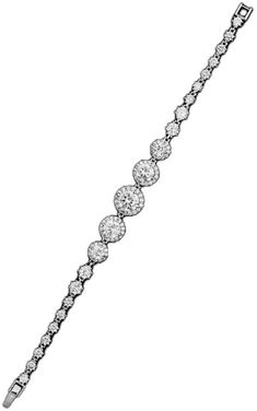 a diamond bracelet on a white background