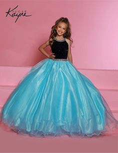 Bring the drama at your next pageant in this beautiful sequin stretch velvet. The beaded collar and waist band accent the sequin sparkles with just enough bling. Fitted Blue Sequined Pageant Dress, Elegant Sequin Dress For Pageants, Elegant Fitted Pageant Dress With Sequins, Elegant Fitted Sequin Pageant Dress, Glamorous Sequin Dress For Pageants, Fitted Sequin Pageant Dress For Prom Season, Glamorous Fitted Sequin Pageant Dress, Glamorous Fitted Pageant Dress With Sequins, Embellished Fitted Pageant Dress