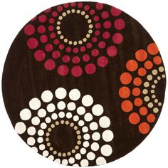 a brown and red rug with circles on it