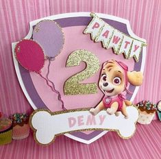 a pink and purple birthday card with a cartoon character on it