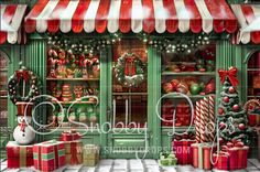 a painting of a store front with christmas decorations and presents on the windowsills