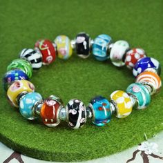 "6.5\", vintage artisan Murano glass colorful beads with sterling 925 silver trims and elastic band, stamped 925" Murano Glass Bead Jewelry, Multicolor Murano Glass Spacer Beads, Multicolor Stretch Bracelet With Polished Beads, Multicolor Stretch Bracelet With Polished Beads As Gift, Multicolor Polished Beads Stretch Bracelet As Gift, Elastic Band, Murano Glass, Pandora Charm Bracelet, Elastic