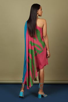 Hot pink and blue one-shoulder draped dress with uneven hem, knotted shoulder and green abstract pattern print.
Component: 1
Printed
Neckline: Asymmetric
Sleeve Length: Sleeveless
Fabric: Natural Crepe
Color: Blue, Pink
One shoulder
Asymmetric hem - Aza Fashions One Shoulder Drape Dress, Green Abstract, Draped Dress, Dress For Women, Asymmetric Hem, Aza Fashion, Abstract Pattern, Dresses Online, Blue Dresses