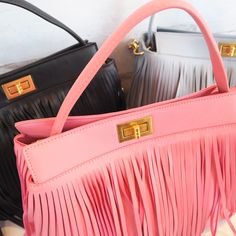 Are feeling the fringe? Theres nothing like a fringe statement handbag to bring a cute outfit together! This bag is a soft vegan leather with gold hardware and 3 zipper compartments. Each of these handbags can easily convert from a handbag to a crossbody bag with just a swap of a strap! Free shipping & Free gift included with purchase! Chic Travel Bag With Fringe, Chic Fringe Hobo Bag For Travel, Chic Travel Hobo Bag With Fringe, Chic Travel Shoulder Bag With Fringe, Chic Fringe Shoulder Bag For Travel, Chic Tote Shoulder Bag With Tassels, Chic Crossbody Hobo Bag With Fringe, Trendy Fringe Satchel Shoulder Bag, Chic Fringe Crossbody Shoulder Bag