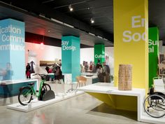 an exhibit room with several different types of bicycles