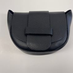 Adjustable Strap Interior Zipper Snap Closure 7 X 5 X 3 inches Modern Black Coin Purse With Removable Pouch, Black Pouch Belt Bag As Gift, Modern Crossbody Pouch As Gift, Modern Crossbody Pouch For Gifts, Modern Crossbody Pouch As A Gift, Saddle Crossbody Bag, Italian Leather, Snap Closure, Saddle