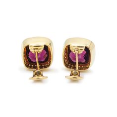 This is part of Chairish’s Fine Jewelry assortment.  Gender: Ladies  Metal Type: 18K Yellow Gold  Width: 16.80 mm  Weight: 17.00 grams  18K yellow gold diamond and garnet clip-on stud earrings. The metal was tested and determined to be 18K yellow gold. Engraved with "Spark" and "18K". In excellent condition.  Pre-owned. Might show minor signs of wear.  Bezel Set in 18 Karat Yellow Gold with:  Two (2) natural, square cushion-shaped, checkerboard cut, garnets:  Species: Natural Garnet Variety: Natural Garnet Measurements: 12.45mm x 12.45mm x 8.23mm in depth. Weight Range: 11.674 ct. - 11.935 ct. Estimated Total Weight: 23.61 ct. Cut Style: Crown - Checkerboard Cut Color(s): Red  Bezel Set in 18 Karat Yellow Gold with:  Fifty-six (56) round brilliant cut natural diamonds:  Measurements: 1.30m Blue Stud Earrings, Rose Gold Earrings Studs, Rose Gold Studs, Opal Earrings Stud, Opal Studs, Garnet Earrings, Modern Earrings, Pearl Stud Earrings, Sterling Silver Studs