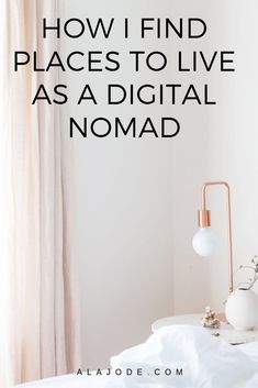 a bed with white sheets and pillows in front of a window that says how i find places to live as a digital nomad