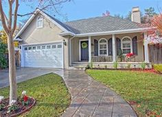 a house that has a driveway in front of it