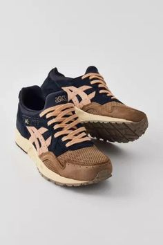 Premium GEL-Lyte V sneakers by ASICS. Paneled upper in a low top silhouette with a lace closure front. Durable textured tread at the outsole. Features: - ASICS GEL-Lyte V premium sneakers - Essential ASICS sneakers - Lace-up style Content + Care: - Mixed media, rubber - Spot clean - Imported.ASICS began in 1949 with Mr. Kihachiro Onitsuka selling basketball shoes out of his living room. With continued advancements in shoe technology and a dedication to classic silhouettes, ASICS remains an innovator in style and sport. Casual Asics Sneakers With Laces, Asics Casual Sneakers With Rubber Waffle Outsoles, Leather Asics Sneakers With Laces, Asics Sneakers With Cushioned Footbed For Walking, Asics Sneakers With Gum Sole For Sports, Casual Asics Sneakers With Gum Sole, Casual Asics Sneakers For Outdoor, Brown Synthetic Sneakers With Rubber Waffle Outsoles, Asics Casual Sneakers With Gum Sole