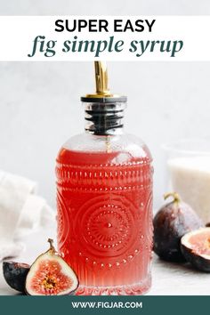 a bottle filled with liquid next to figs and other fruit on the table text overlay reads super easy fig simple syrup