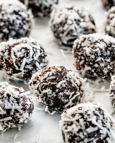 chocolate truffles with coconut flakes and shredded coconut on top are ready to be eaten