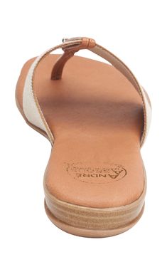 Cushioned with Featherweight technology, this sleek sandal is crafted with a wide elastic band and a slim leather thong strap for an altogether carefree fit. Flat sole Cushioned footbed with Featherweight technology that mimics the natural movement of the foot Leather and textile upper/textile lining/rubber sole Made in Spain Classic Beach Sandals With Arch Support, Classic Sandals With Arch Support And Single Toe Strap, Leather Toe Loop Flip Flops For Everyday, Leather Toe Post Flip Flops With Arch Support, Adjustable Toe Post Sandals For Everyday, Everyday Toe Post Sandals With Cushioned Footbed, Adjustable Flip Flops With Arch Support For Everyday, Natural Leather Sandals For Everyday, Everyday Natural Leather Sandals