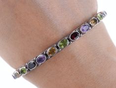 "Retro Sterling Garnet, Amethyst, Peridot, topaz Bangle bracelet. All natural semiprecious stones with no issues. 7.5\" inside diameter 25 grams." Adjustable Multi-stone Gemstone Bracelet, Multi-stone Amethyst Bracelet, Cool Piercings, Retro Bracelet, The Bangles, Jewelry Lookbook, Cute Bracelets, Jewelry Inspo, Dream Jewelry