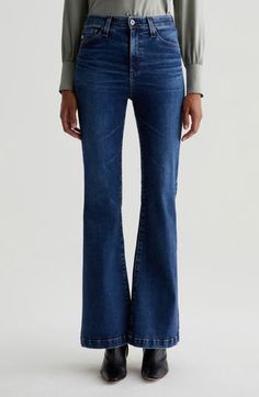 Rock a chic, '70s-inspired look in cleanly styled jeans flaunting a superhigh waist and full-length flared legs that create a dramatic silhouette. 33" inseam, 22" leg opening; 11" front rise Zip fly with button closure Five-pocket style 98% cotton, 2% elastane Machine wash, tumble dry Imported Retro High Rise Flares For Fall, Dark Wash Flared Hem Flares For Fall, Modern Flare Jeans, Chic High Rise Flare Jeans For Fall, Dark Wash Full-length Flares For Fall, Dark Wash Full Length Flares For Fall, Dark Wash Full Length Fall Flares, Fall Dark Wash Full Length Flares, Modern High Rise Flare Jeans For Fall