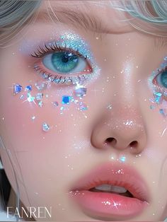 a close up of a woman's face with blue eyes and glitter on it