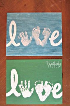 two handprinted canvass with the words love and baby's feet on them