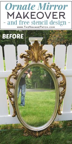 a mirror that is sitting in the grass next to a white fence with a man taking a photo