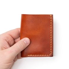 A leather Trifold wallet that carries everything you could possibly need.On the go, this wallet is the perfect accessory. You'll soon find that this wallet can take everything you throw at it and store it neatly folded away. Flip out your ID whenever it's needed, and fill the billfold with any size currency, notes, or even receipts.This full-grain leather wallet is designed to hold a lot of cards and a lot of cash. Easily flip out your ID when it's needed and the wallet will naturally fold back Full Grain Leather Wallet, Leather Trifold Wallet, Horween Leather, Engraved Initials, Flip Out, Personalized Keychain, Trifold Wallet, The English, Custom Engraving