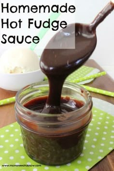 homemade hot fudge sauce being poured into a jar