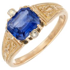 Vintage Victorian Bright blue sapphire and diamond engagement ring, circa 1880. 1.57ct octagonal cut blue sapphire mounted in a 14k yellow gold setting with 2 rose cut diamonds. The GIA has certified the sapphire place of origin is Sri Lanka. Natural with simple heating. The setting is hand engraved. 1 octagonal square blue sapphire, MI approx. 1.57cts GIA Certificate # 1236250676 2 rose cut diamonds, J SI approx. .2cts Size: 5.75 14k yellow gold Tested: 14k 4.0 grams Width at top: 9.6mm Height Sapphire And Diamond Engagement Ring, Diamond Sapphire Engagement Ring, Sapphire Diamond Engagement, Gia Certificate, Contemporary Engagement Rings, Platinum Diamond Engagement Rings, Round Sapphire, White Gold Set, Blue Sapphire Diamond