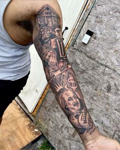 a man with a tattoo on his arm