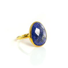 This beautiful large teardrop oval ring is the perfect statement piece for everyday wear, or a special occasion. The bezel set ring is made with a large teardrop faceted with natural Lapis Lazuli in 18K Vermeil Gold. The ring has a 925 stamp. Gemstone size is approximately 13 x 16 mm. Please specify your size at checkout. Since I use natural gemstones, the stones may vary slightly in color, shape and size. This ring is available in three finishes: ✦ 18K VERMEIL GOLD ✦ BRIGHT STERLING SILVER ✦ 18 Oval Faceted Blue Jewelry, Blue Oval Faceted Jewelry, Oval Blue Faceted Jewelry, Oval Large Stone Sapphire Ring Gift, Oval Sapphire Ring With Large Stone As Gift, Sapphire Crystal Oval Ring For Gift, Faceted Oval Crystal Ring As Gift, Oval Faceted Crystal Ring As Gift, Faceted Oval Crystal Ring For Gift