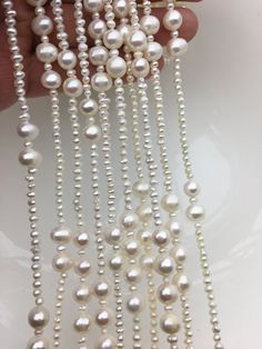 quantity: 1 pc pearl jewelry: long pearl necklace pearl body: AA+ pearl grade: AA+ pearl size: 3mm/8mm pearl luster:high pearl shape: potato pearl length: 62''  pearl color: white AA same type necklace link: https://www.etsy.com/hk-en/listing/472336670/59-inches-aa-nugget-pearl-necklace8-9x9?ref=listings_manager_grid Back to Other Jewelry Section 01: "Tahitian,Akoya,Sea Pearl" Section: https://www.etsy.com/shop/WenPearls?section_id=15806339 02: "Potato/Near Round Pearl" Section: https://www.etsy White Akoya Pearl Necklace In Pear Shape, Elegant White Dangling Beads, White Akoya Pearl Necklace, White Multi-strand Beaded Necklace With Pearl Drop, White Hand-strung Pearl Necklaces, Luxury Hand-strung White Pearl Necklace, White Multi-strand Pearl Drop Necklace, Leather Pearl Jewelry, Big Pearl