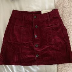 American Eagle High Waisted Skirt, New With Tags Red Mini Skirt With Pockets, Casual Burgundy Mini Skirt, High Waist Red Mini Skirt With Pockets, Burgundy Mini Skirt With Lining, Burgundy Mini Skirt With Lined Detail, Burgundy Lined Mini Skirt, Burgundy Lined Skirt, Fitted Red Skirt With Button Closure, Red Mini Skirt With Button Closure