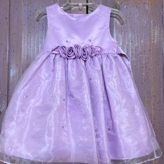 Nwot Vintage Little Girl’s Rare Editions Lilac Sleeveless Dress. Sparsely Scattered Embroidered Polkadots Embellish This Cute Piece. Lilac Rose Appliqu At Waist And A Sash That Ties In Back. Super Cute! Princess Style Sleeveless Purple Dress, Purple Princess Sleeveless Dress, Purple Sleeveless Dress For Dress-up, Purple Sleeveless Dress For Spring Dress-up, Lilac Roses, Rose Applique, Taffeta Dress, Dresses Vintage, Vintage Girls