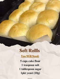 a pan filled with rolls sitting on top of a table