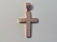 "All of these crosses are 100% Solid Silver and are finished in your choice of either Rhodium, 14k Yellow Gold or 14k Rose Gold. They measure 2\" by 1.5\" Each cross is adorned with 500 micro-paved handset simulated Diamonds, total of 3 ct!! SUPER ICY!! Fits chains up to 8mm thick (NO CHAIN INCLUDED). Weighs 20 grams!" Rose Gold Cross Hallmarked Jewelry, Sterling Silver Cross, Silver Cross, Solid 925 Sterling Silver, Gold Finish, Diamonds, 925 Sterling Silver, Yellow Gold, Rose Gold