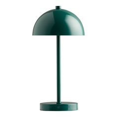 a green table lamp on a white background