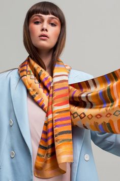 In this four-colorway series of long rectangular scarves, designer Dikla Levsky’s delivers her version of stripes, one of the strongest motifs in the history of textile design. Diamond elements and striking color combinations add elegance and flair to a print anyone would love.Size: 35×180 cm (approximately 13.77×70.86 inch)>100% silk>Made in Italy>Dry clean>Gift box included>Please Note: The color of the fabric and pattern may vary slightly from the way it appears on your screen. Scarf Photoshoot, Scarf Photography, Designer Shawl, Long Silk Scarf, Ways To Wear A Scarf, Silk Twill Scarf, Striped Scarf, Pretty Scarves, Luxury Scarves