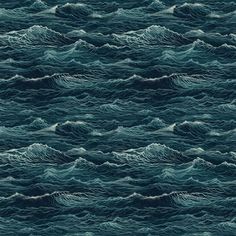 the ocean is very dark and blue with waves