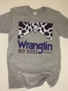 Wranglin Boy Mama Shirt, Womens Boy Mom Shirt, Boy Mama Tee, Wranglin Mama, Western Shirt Women, Cowskull Shirt Incredibly soft, lightweight, and airy too, this T-shirt isn't just cute, but keeps you super comfy too. Gildan Softstyle T-shirt Fade-proof, vibrant sublimation prints Unisex fit Doesn't shrink or fade Shirts are made to order and will vary in bleach pattern. Boy Mama Shirts, Western Shirt Women, Mom Checklist, Duck Hunting Shirts, Boy Mom Shirt, Mom Of Boys Shirt, Boy Mama, Mama Tee, Group Shirts