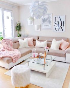 a living room filled with lots of furniture and decor