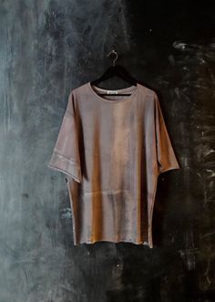 Naturally dyed cotton top. Loose fit dystopian long t-shirt. Raw edge sleeve, neck and bottom.  Fabric is hand dyed using organic plant matter. Each piece is dyed individually and no two can ever be the same. Loose fit M size  Measurements: Chest: 51" (130 cm)  Bottom: 51" (130 cm)  Shoulders: 26" (67 cm)  Sleeve: 11" (28 cm)  Length: 31" (78 cm)  One of the kind top! #185 Organic Plant, Long Tee, Long T Shirt, Long Tshirt, Naturally Dyed, T Shirt Men, Raw Edge, Cotton Tops, Slow Fashion