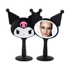 Impressions Vanity presents Kuromi's lighted makeup mirror, which makes your everyday makeup routine easier and more stylish. This LED makeup mirror will not only enhance your daily beauty rituals but also adorn your makeup desk with an extra touch of cuteness. KUROMI DESIGN: The hand mirror for desk features Kuromi's Figural Shaped Design with a pink skull design which adds a touch of cuteness to your makeup routine DETACHABLE MAGNETIC BASE: The portable mirror comes with a magnetic ball standi Kuromi Mirror, Mirror For Desk, Kuromi Design, Small Vanity Mirror, Standing Base, Travel Makeup Mirror, Sanrio Stuff, Portable Mirror, Makeup Desk