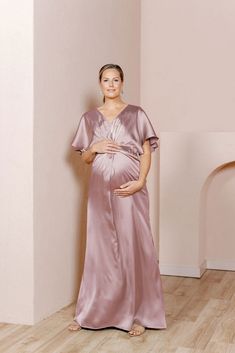 Model: Alex; Size: 14 Elegant V-neck Maternity Gown, Elegant Pink Maternity Dress, Elegant Pink Maternity Gown, Fitted Pink Maternity Bridesmaid Dress, Elegant Pink Maternity Bridesmaid Dress, Elegant Maternity Gown With V-neck, Elegant Maternity V-neck Gown, Elegant Pink Maternity Maxi Dress, Feminine Pink Maxi Dress For Maternity Wear